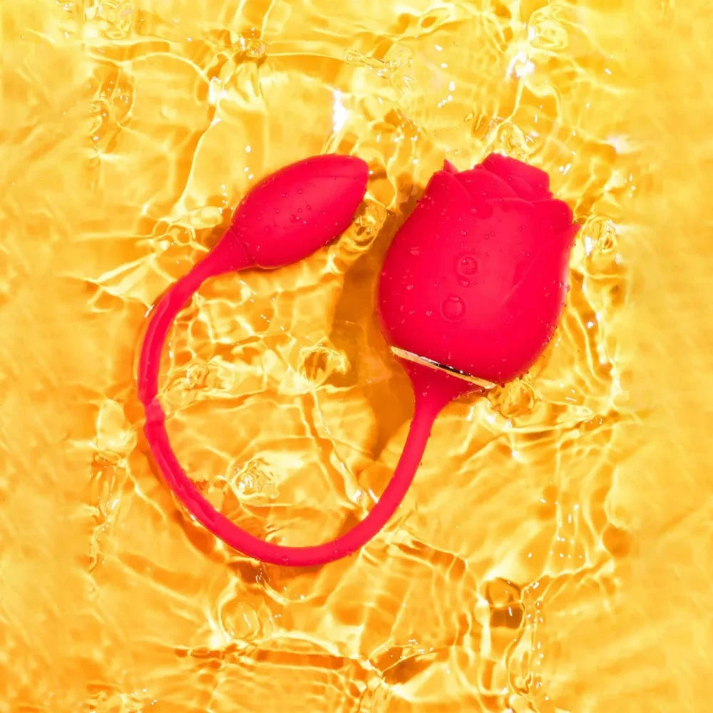 2-in-1 clitoral suction stimulator and egg vibrator in water.