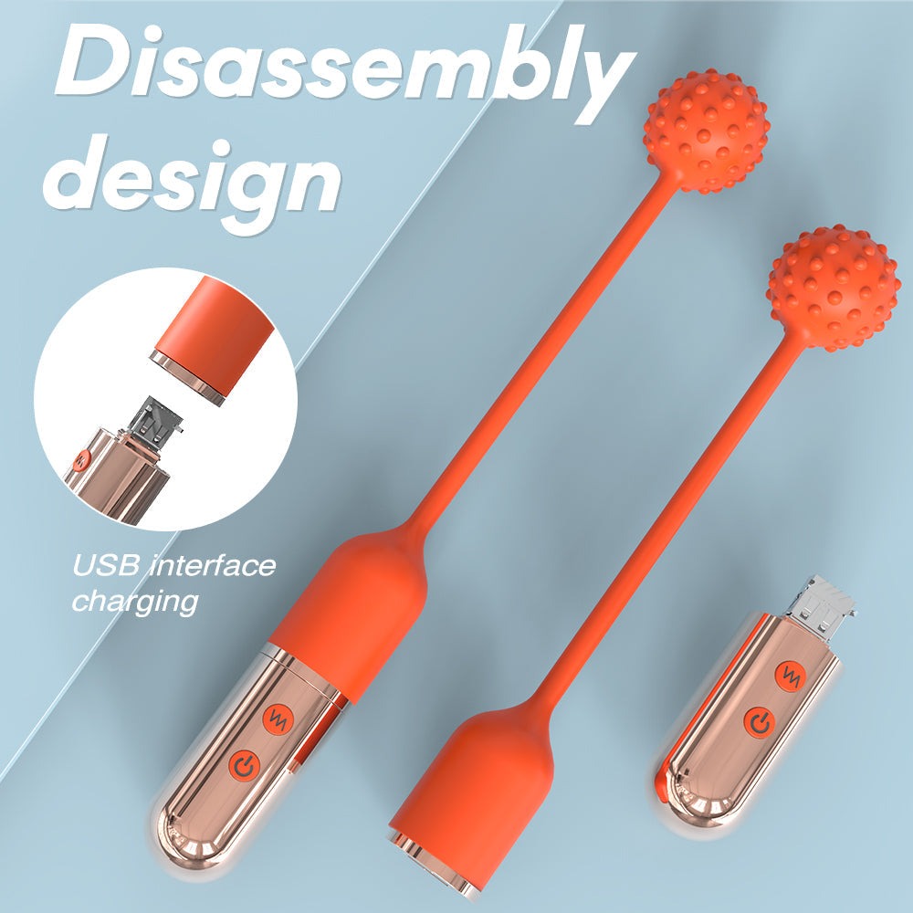 Mini wireless vibrating wand with detachable USB charging and silicone design.