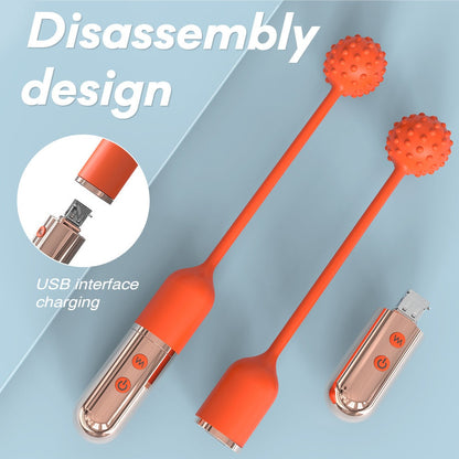 Mini wireless vibrating wand with detachable USB charging and silicone design.
