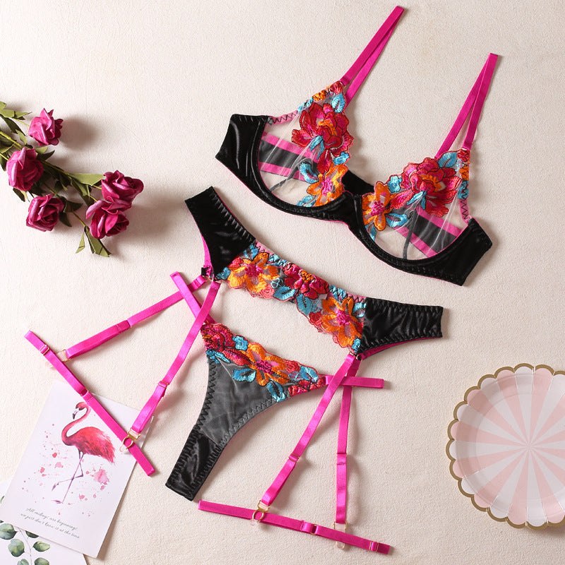 Seductive color-block embroidered floral bra set with underwire, garter belt, thigh garters, and crotchless panties.