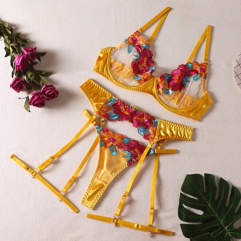 Seductive color-block embroidered floral bra set with underwire, garter belt, thigh garters, and crotchless panties.