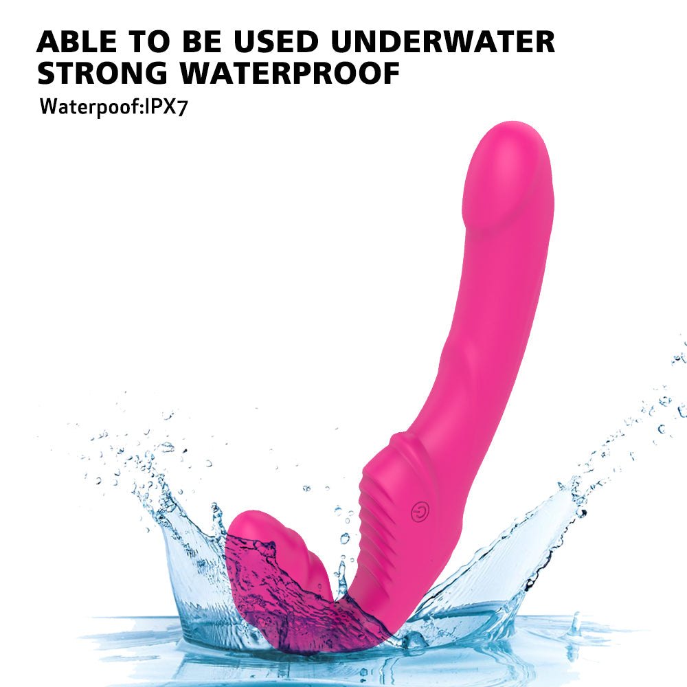 Rechargeable waterproof wearable vibrating dildo on watery surface.