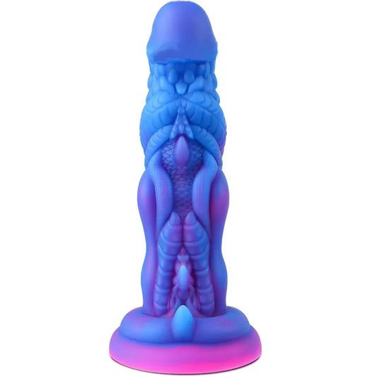 Dragon dildo with textured design and suction cup base in vibrant blue and pink silicone.