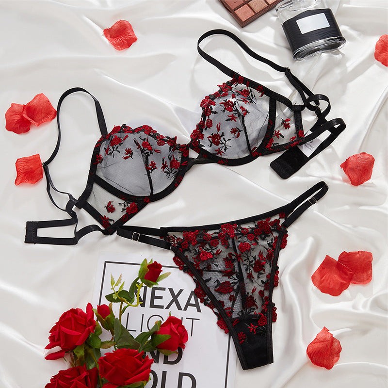 Wesweetie Bestselling Underwire Sheer Mesh Lingerie Set with red floral embroidery on a white satin background.