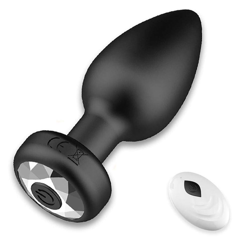Anal plug adult sex toy with remote, LED light, and 10 vibration modes, made of safe silicone material.