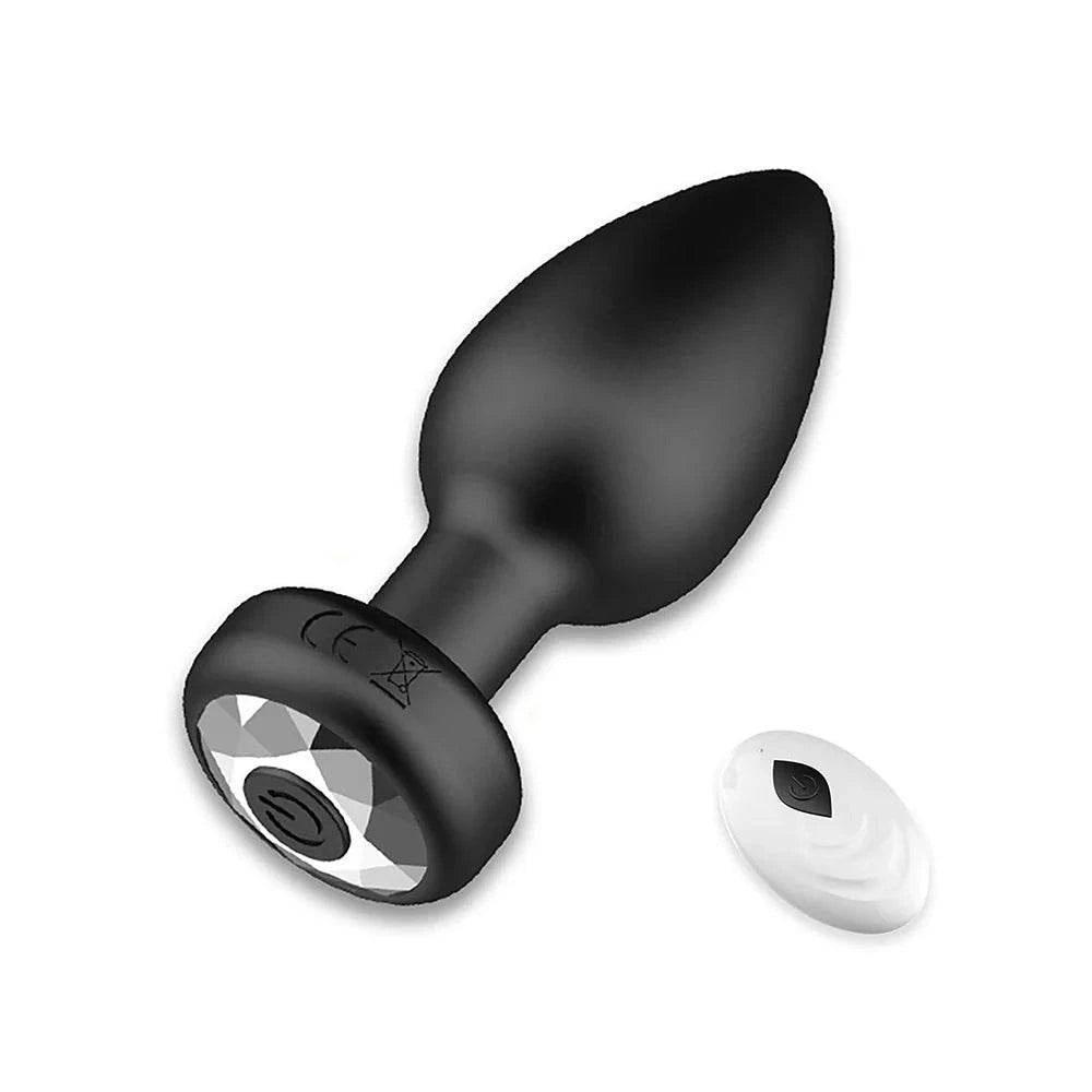 Vibrating anal plug with remote, LED light, waterproof, black silicone design.