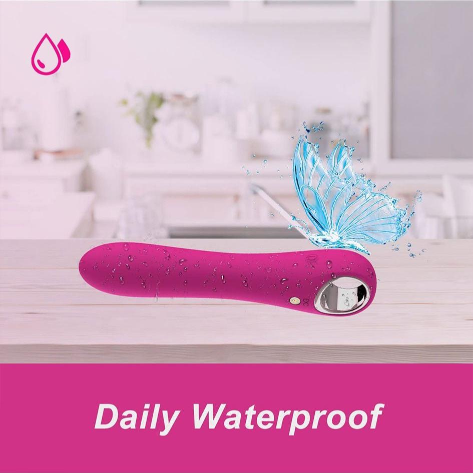 G Spot Vibrator Dildo with 10 Vibration Modes; waterproof and rechargeable design on display with a splash effect.
