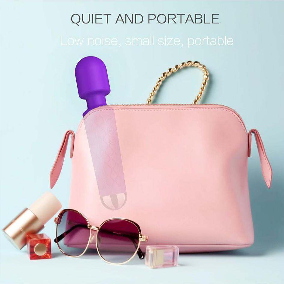 Portable Knight Vibrator in pink bag, compact clitoral stimulator for on-the-go pleasure.